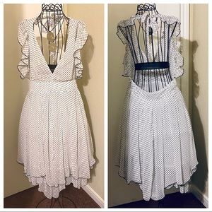 Fumblin Foe Polka dot flirty dress. Side zipper